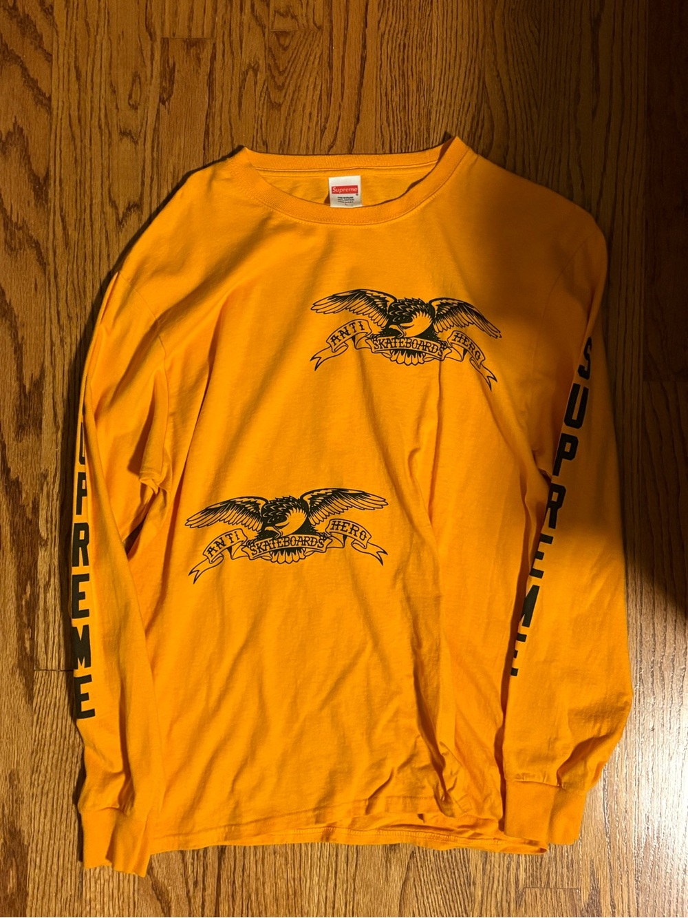 Supreme Anti Hero Long Sleeve Graphic Tee - Yellow with Black Print